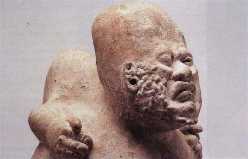 Figurine with ulcerous growth on face dating before 600 BC in ancient America. Image via John L. Sorenson, Images of Ancient America: Visualizing Book of Mormon Life (Provo, UT: FARMS, 1998), 84.