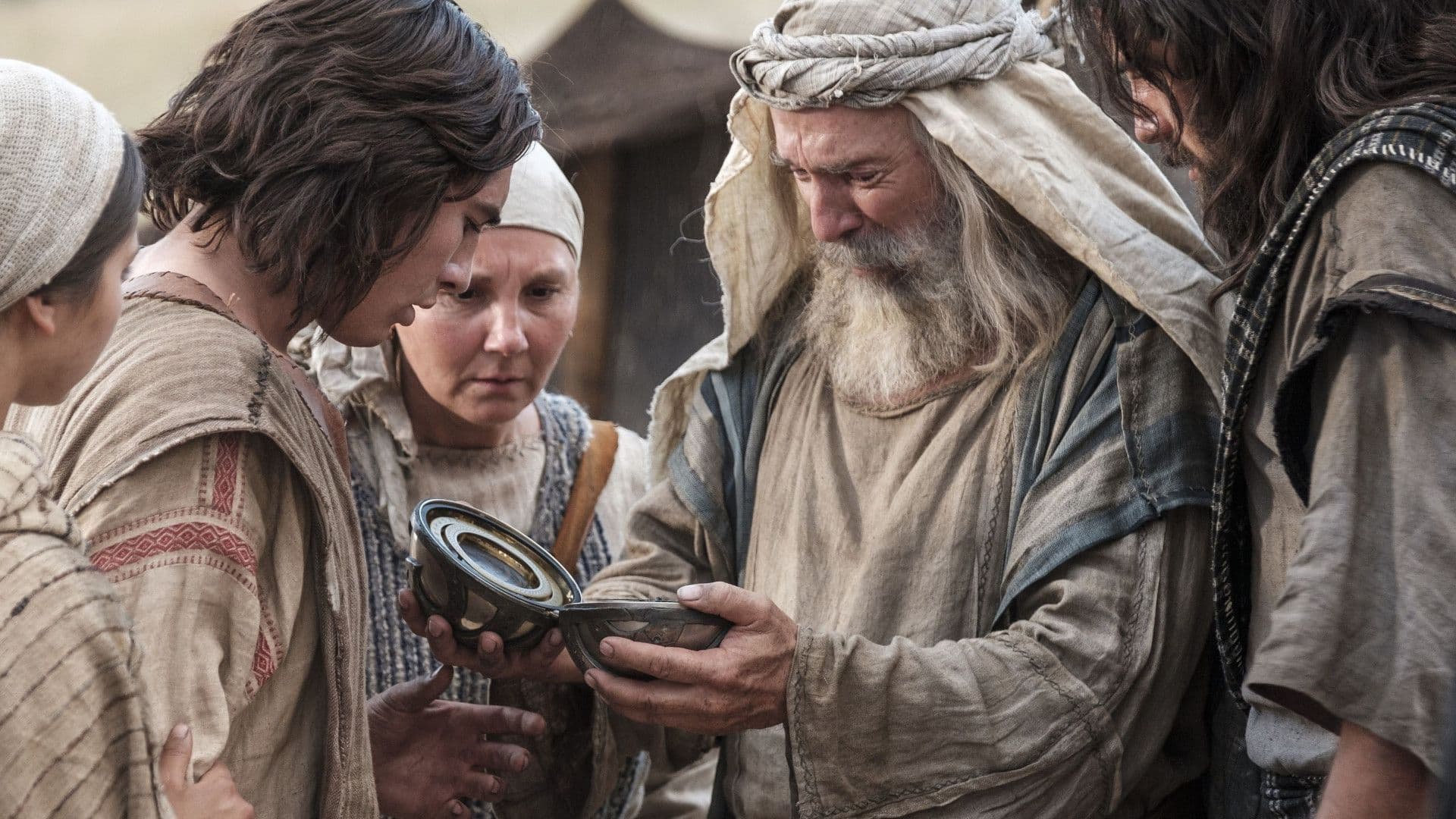 Lehi and members of his family watch the Liahona in this image from the Book of Mormon Videos of The Church of Jesus Christ of Latter-day Saints.