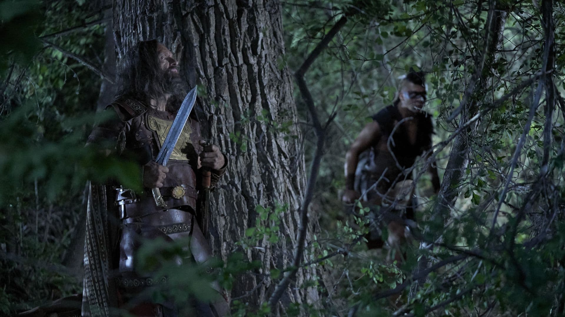 Moroni hides from a Lamanite in this image from the Book of Mormon Videos of The Church of Jesus Christ of Latter-day Saints.