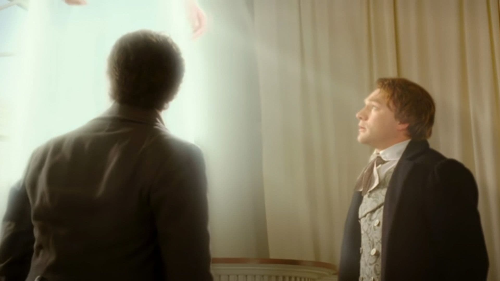 Joseph Smith, Jr. and Oliver Cowdery look up during a vision of the resurrected Christ in this still from “Joseph Smith: Prophet of the Restoration.”