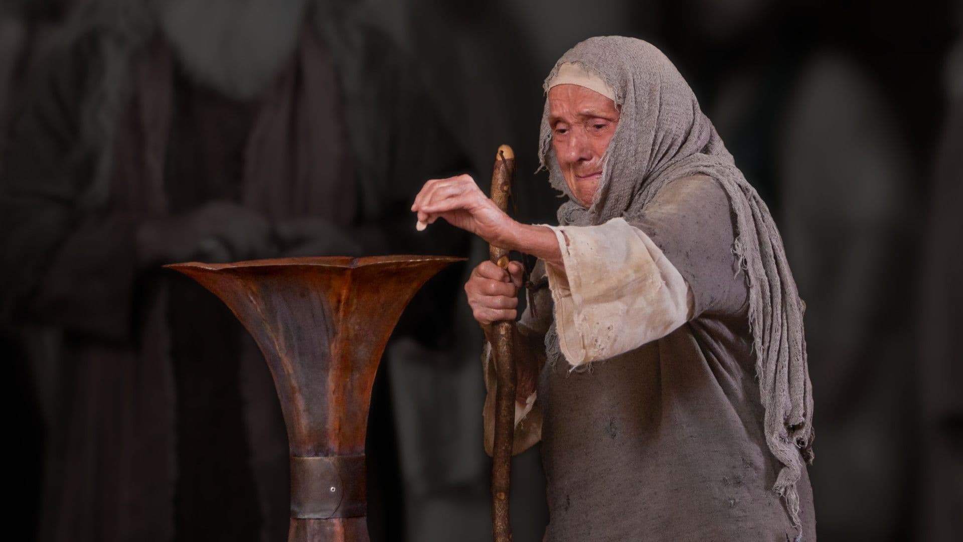 A widow casts a coin into the temple treasury in a still from the Bible Videos of The Church of Jesus Christ of Latter-day Saints.